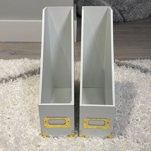 White and gold magazine holders